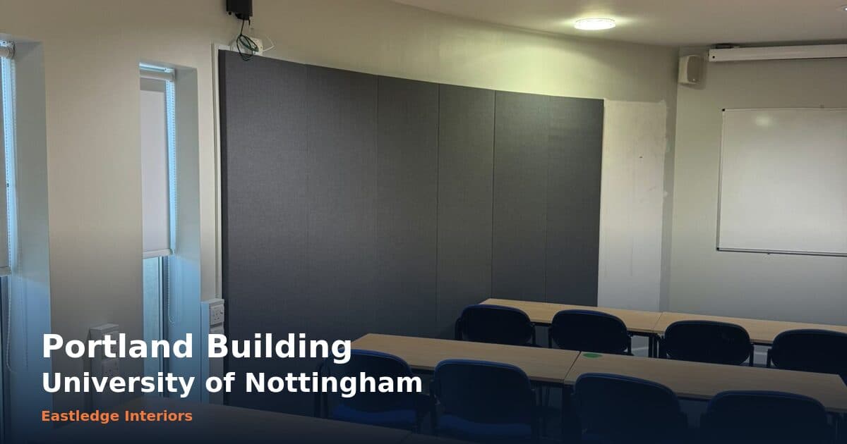 Portland Building teaching room with completed dark acoustic wall treatment at the University of Nottingham