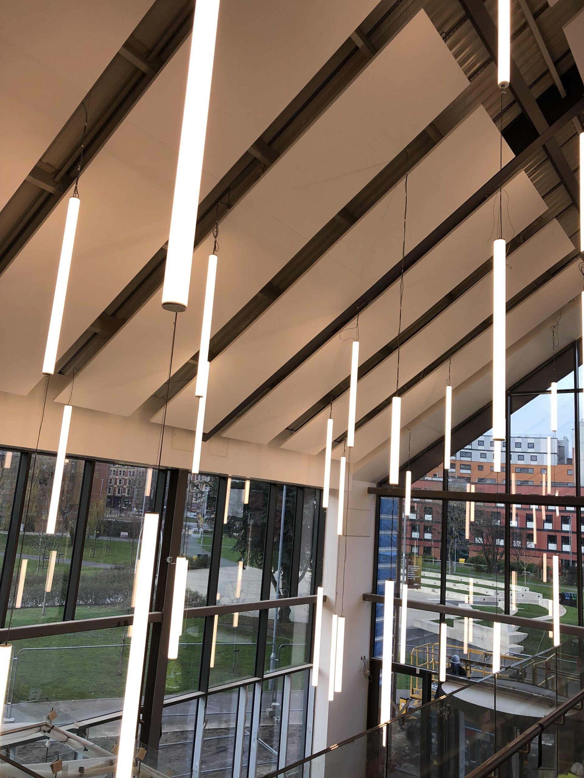 Hunter Douglas solid linear timber ceiling at ground floor, Aston University Students' Union, Birmingham