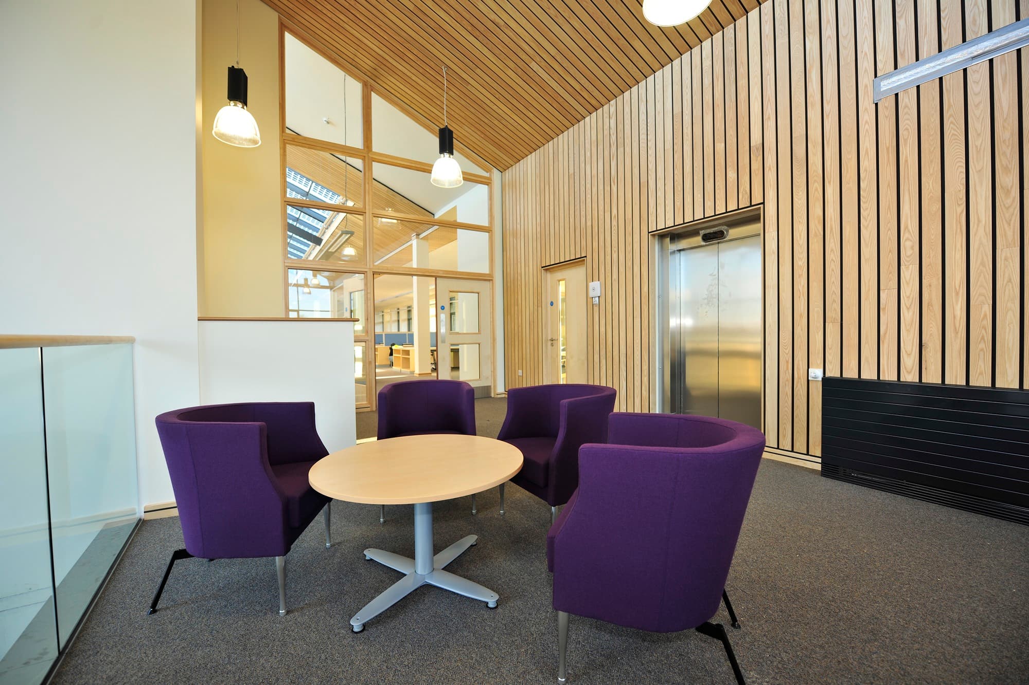 Hunter Douglas solid-wood linear wall panel and ceiling continuity, James Hutton Building, British Geological Survey, Keyworth