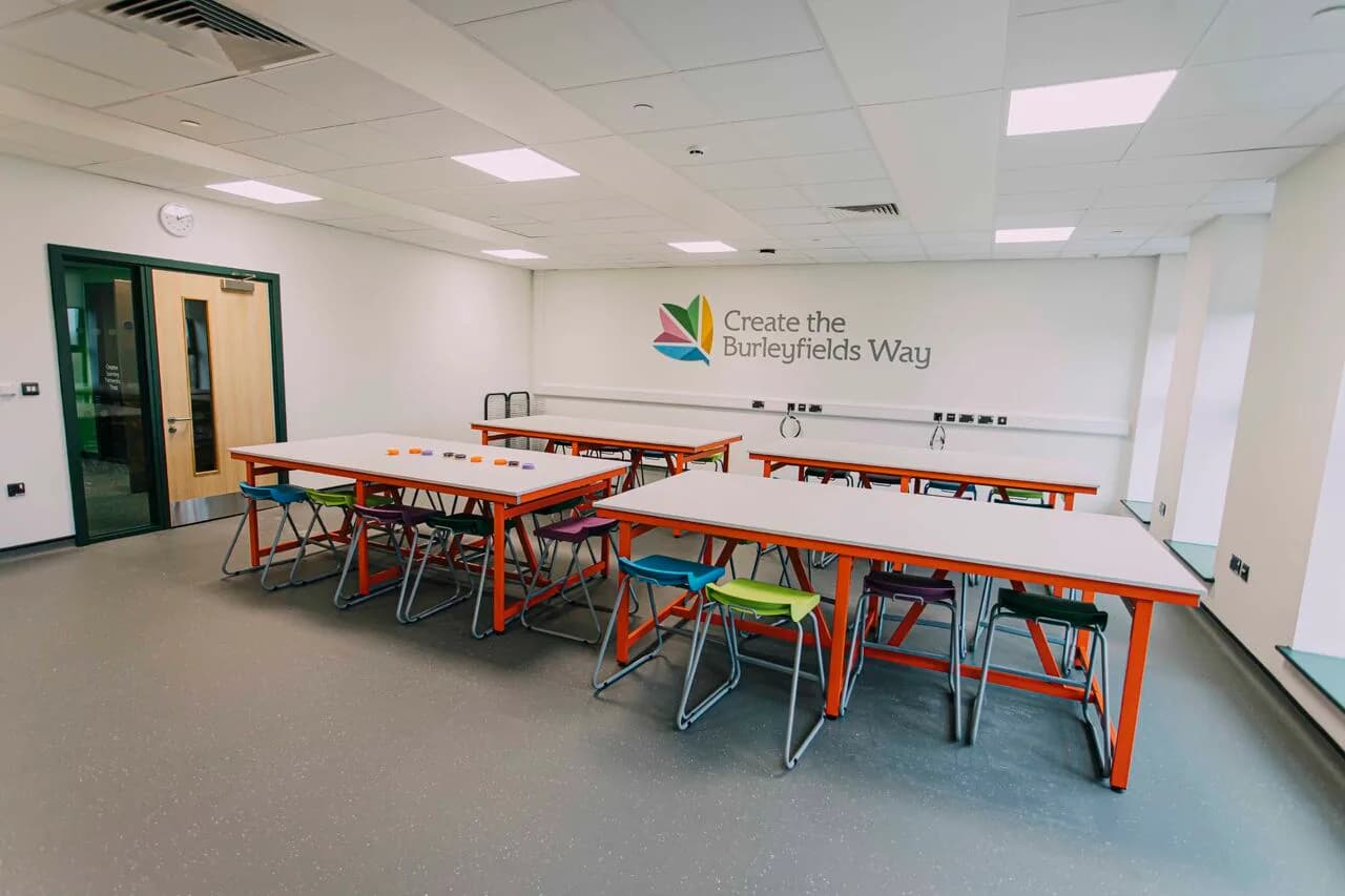 Mineral fibre suspended ceiling installation in progress in a Burleyfield School classroom