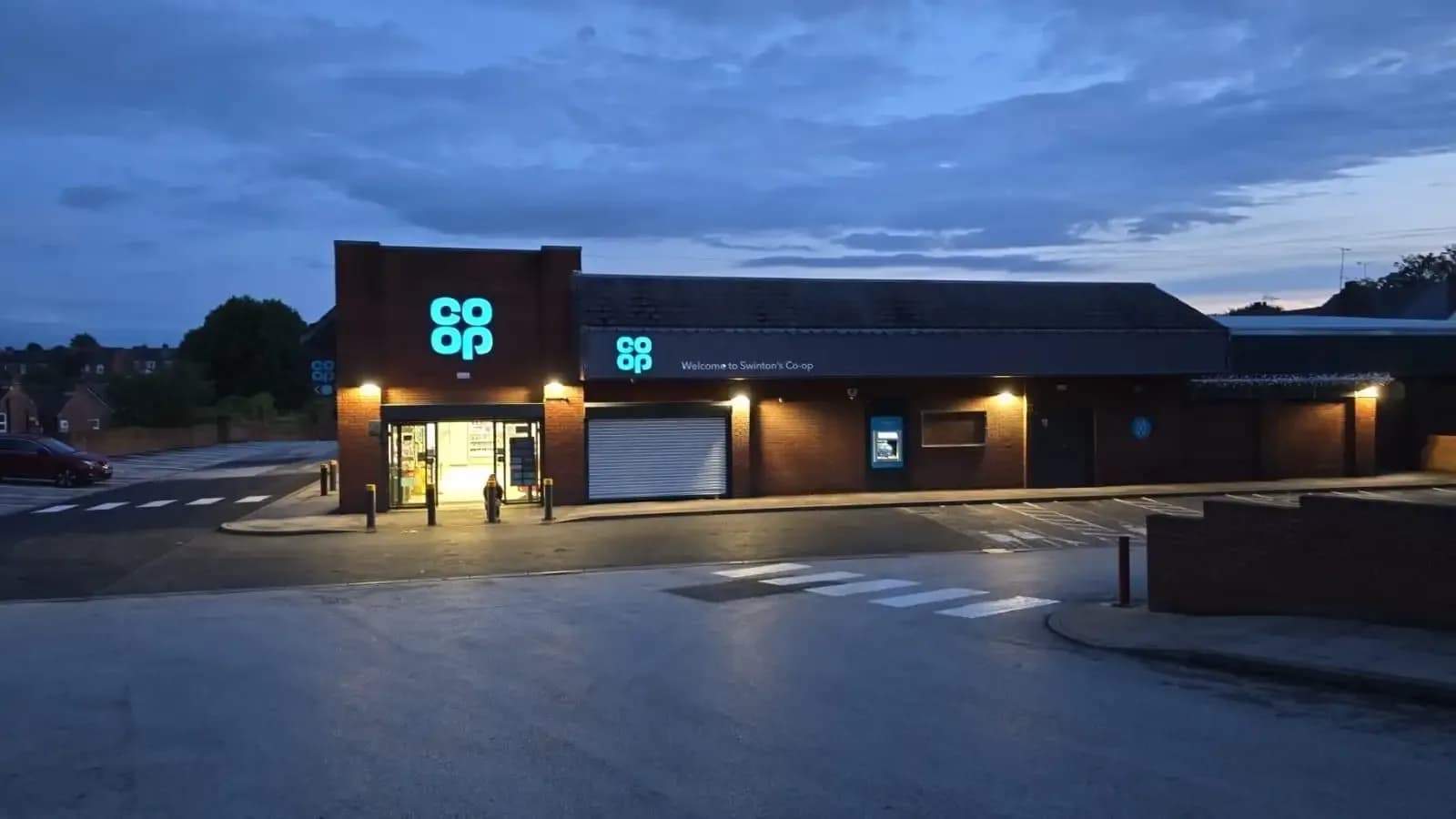 CO-OP Swinton retail interior with completed suspended ceiling, open shopfit layout and integrated lighting