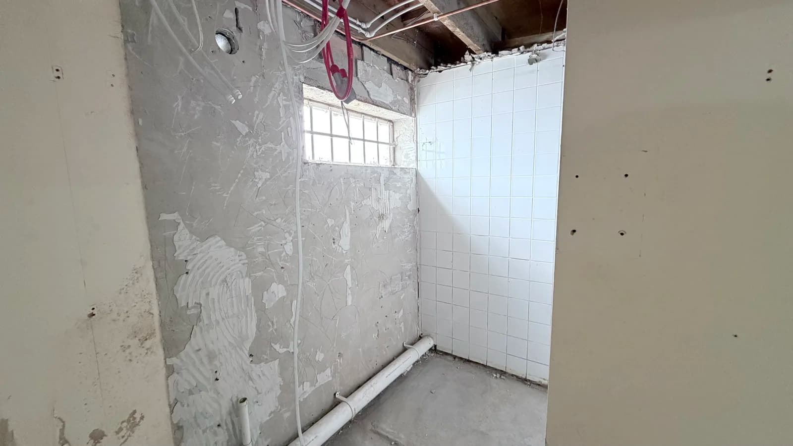 Corner detail of hygienic cladding installation showing internal angle trim at FCC Environment