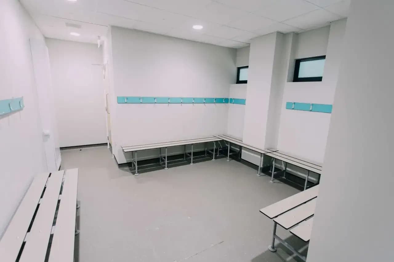 Detail of acoustic panel installation at Ravenshead Leisure Centre showing fixing system and finish