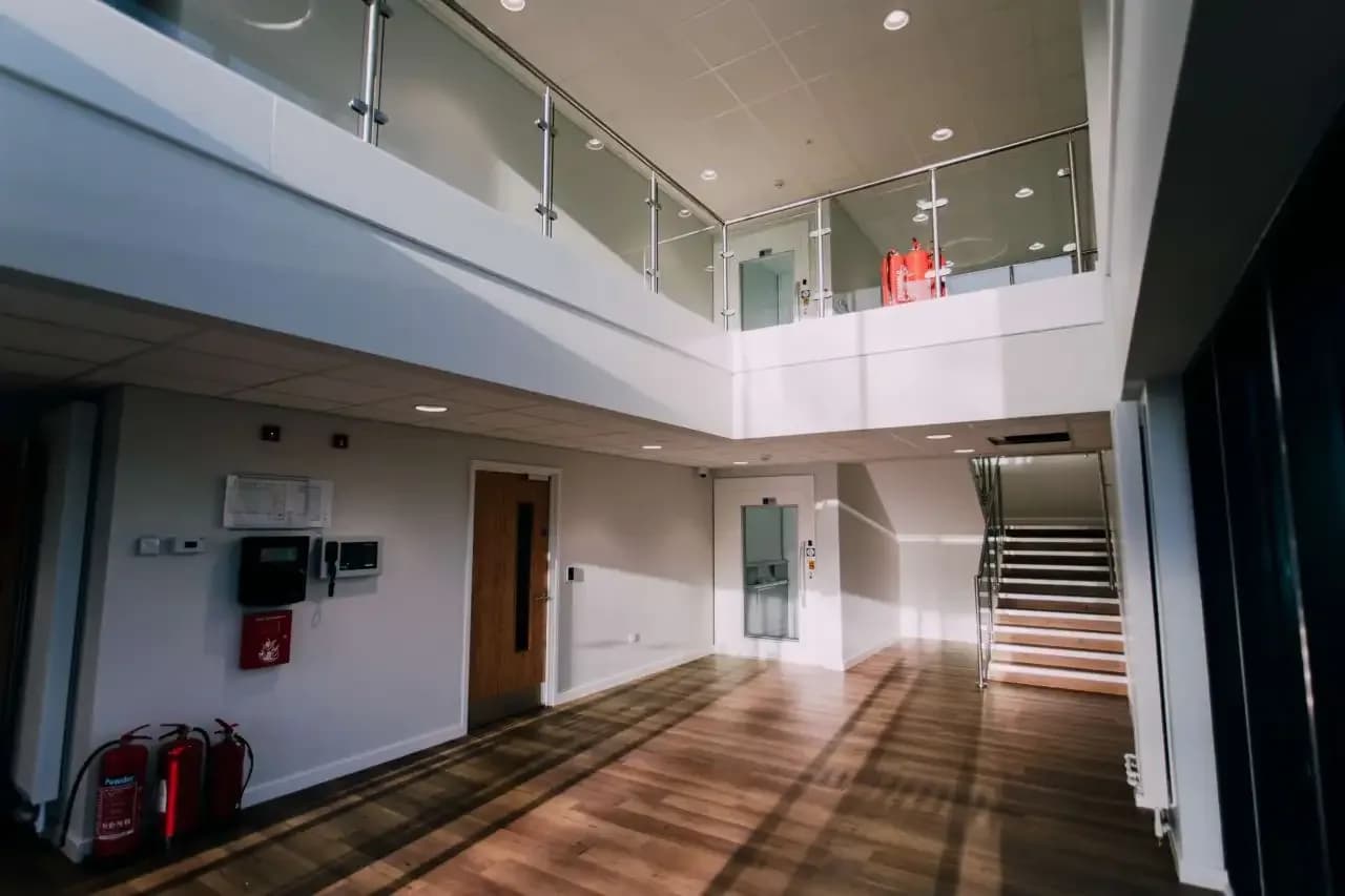 Redmoor Academy interior showing completed acoustic wall treatment and ceiling finishes
