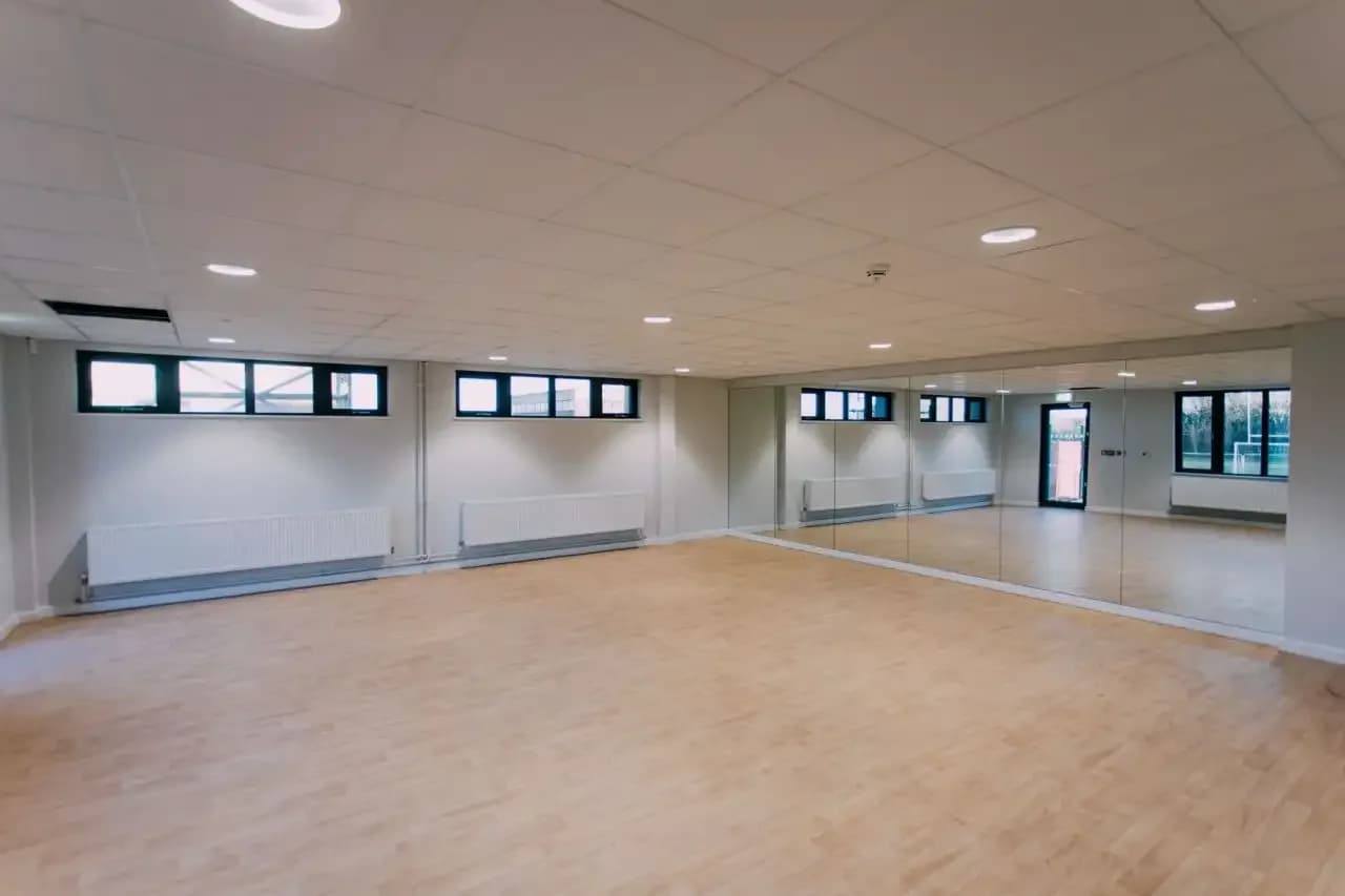Redmoor Academy acoustic treatment showing contrast between panel and wall finishes