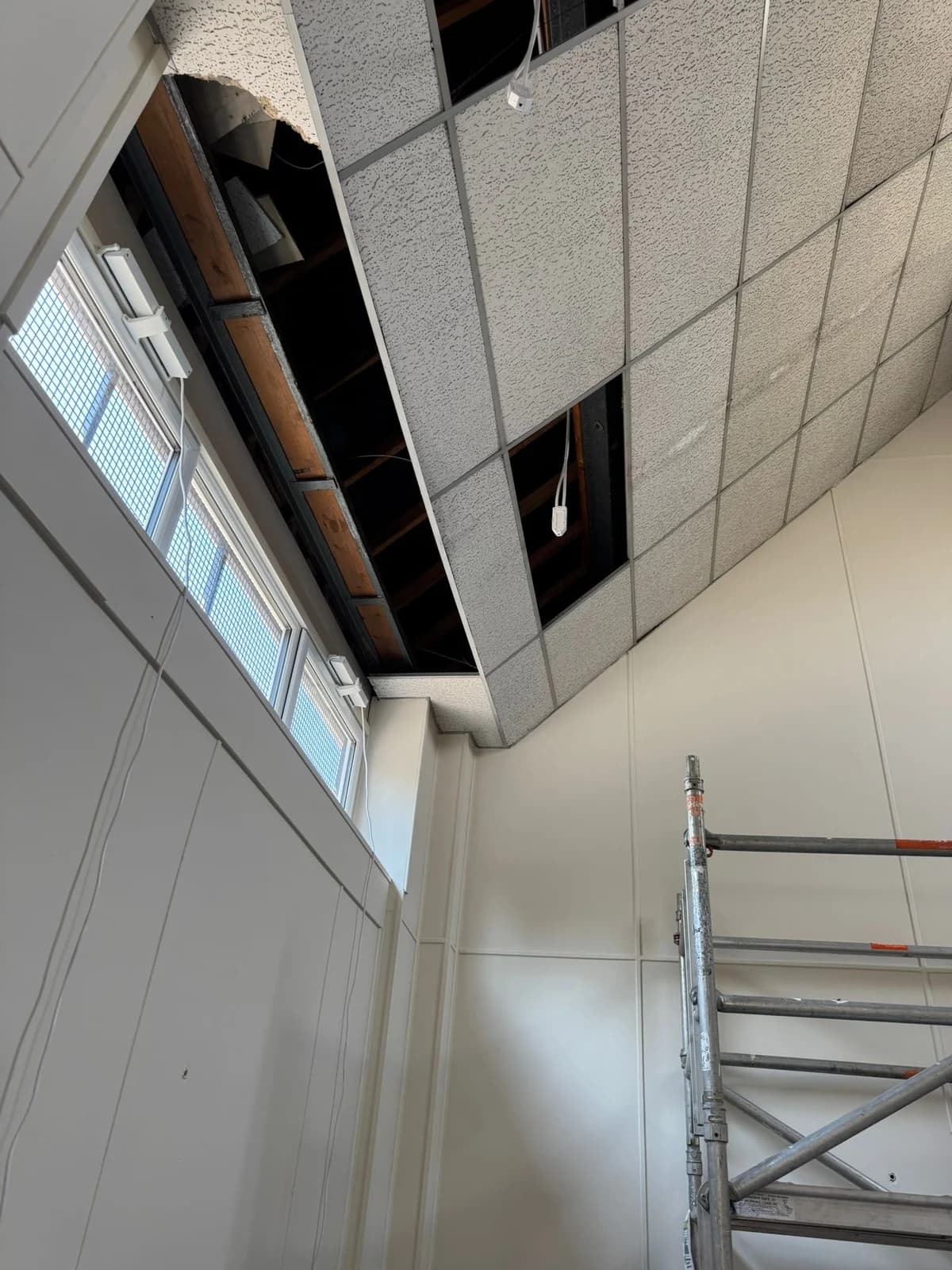 Before suspended ceiling tiles were completed beside a church rooflight in Nottingham