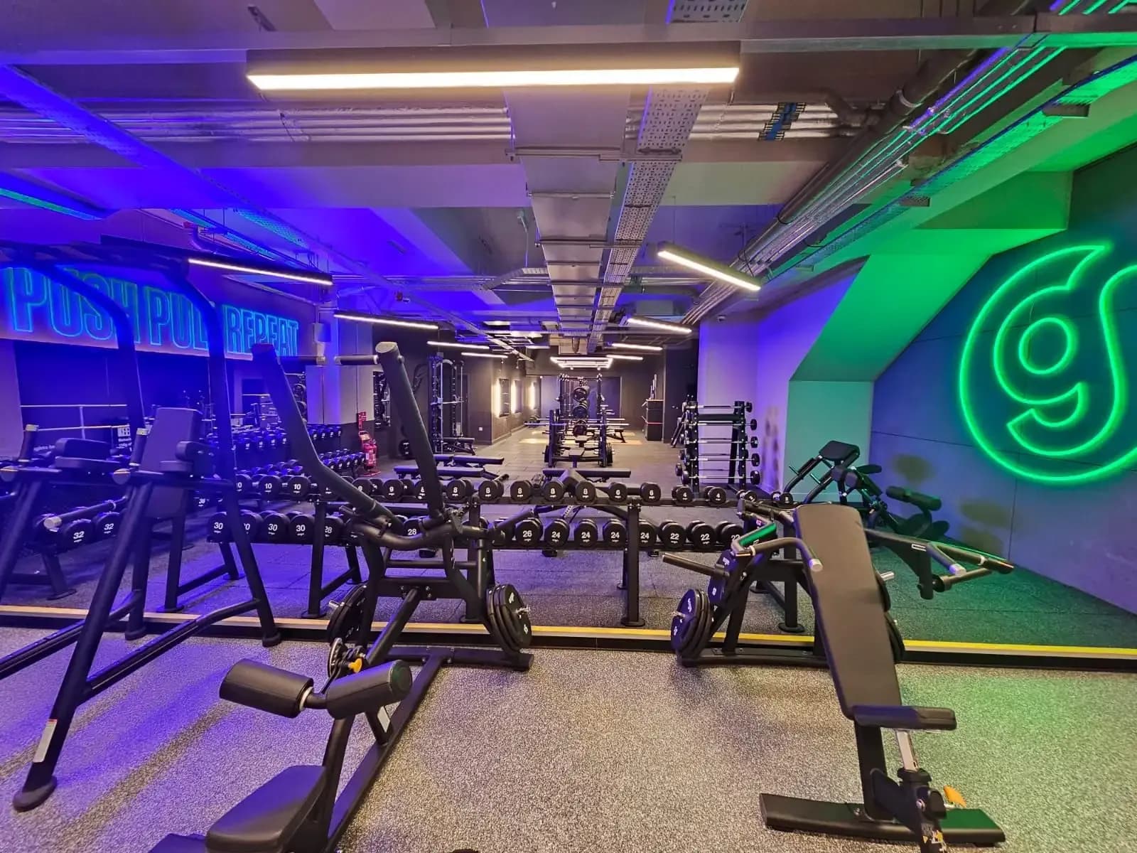 Finished gym interior with acoustic partitions installed by Eastledge at The Gym Group Hendon in London.